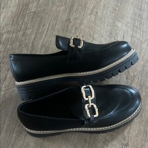 Elegant Black Loafers with Gold Accents
